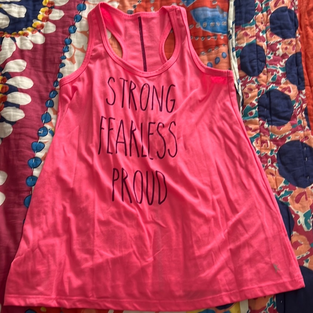 Pink racer back tank “strong fearless proud”